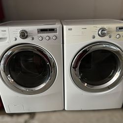 LG washer and electric dryer set. 