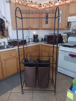 Better homes laundry/ garment rack new .