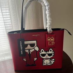 Karl Lagerfeld Maybelle Red Leather, Black Handled Handbag with Karl & Choppette New with Tags!!! Bag measures 10 x 13 x 4.5 all original packing mate