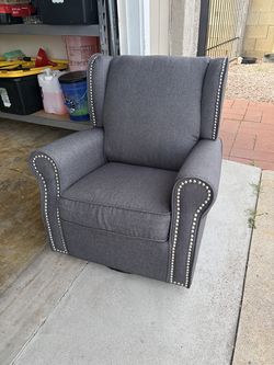 Swivel rocking chair