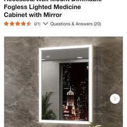 Medícine cabinet/mirror with light