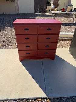 $20 DRESSER PAINTED RED IN GOOD WORKING CONDITION