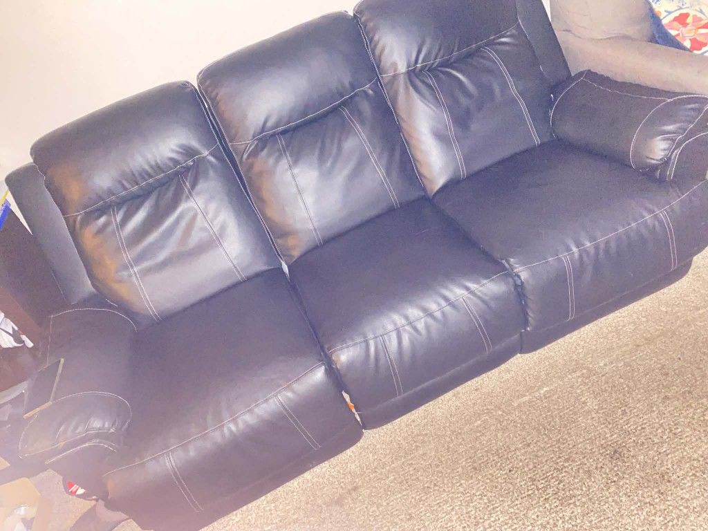 Reclining sofa in excellent condition.