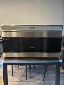 Wolf microwave drawer 24 inch works  perfect in good condition free delivery to garage