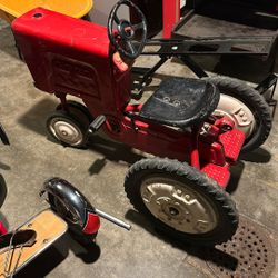 Antique pedal tractor 
