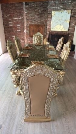Gold dining table with six chairs