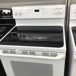 GE 4 Burner Glass Top Range. 1 year Warranty 