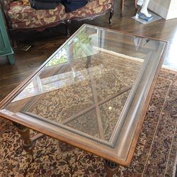 Wood and glass coffee table.