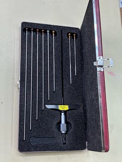 0 to 9.” Depth micrometer