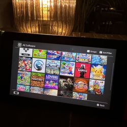 Nintendo Switch + Games 