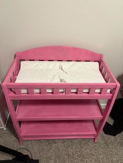 pink baby changing table