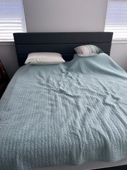 Upholstered king size platform bed frame with headboard