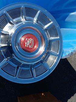 1957 cady hub caps