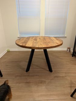 Round Wood Dining Table with Black Metal Legs