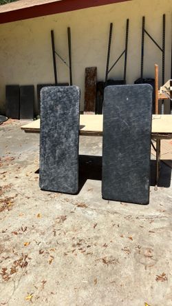 Two portable black tables.