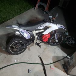 Mini Dirt Bike For Kids Having New Motor In Hand