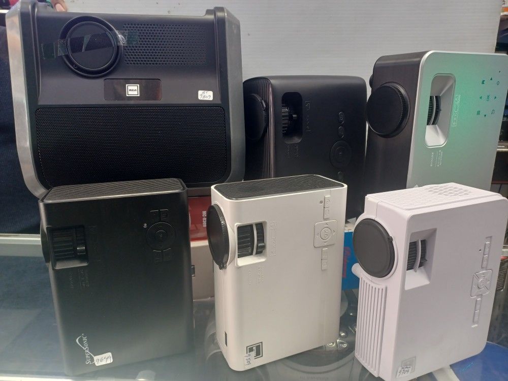 Quality Projector By Rca $45. With Screen $59. With Roku Stick Smart $99