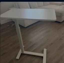 Adjustable desk or table