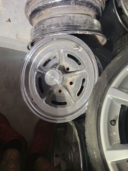 All 4 Buick Rims With Caps 15'