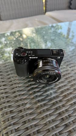 Sony zve-10 , lens sigma 16 mm 1:14 and reiple usb charger