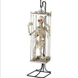 Gemmy spirit Halloween life size cage skeleton prop