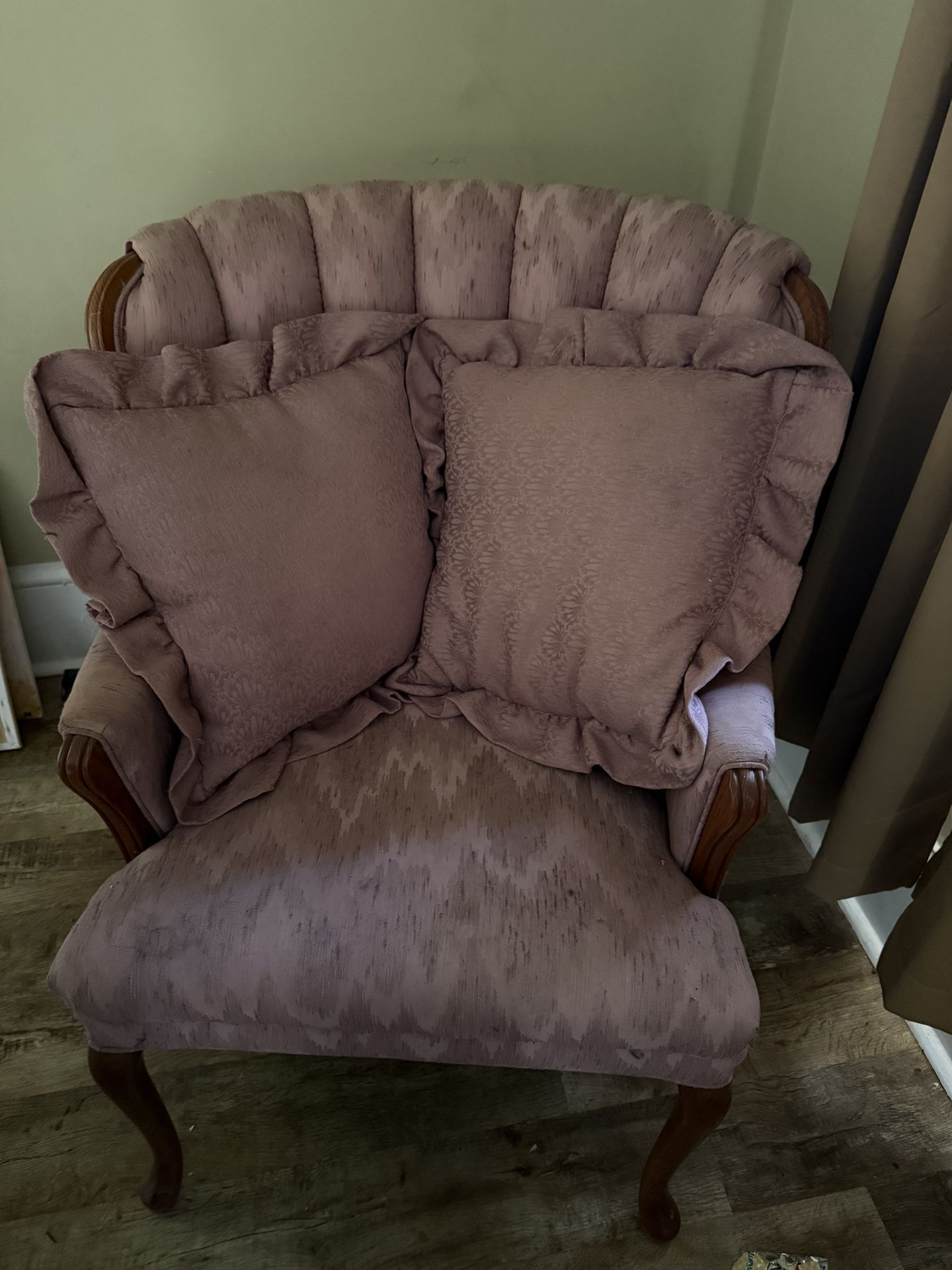 Old Wing Chair In A Rose Pink Color