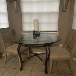 Round glass table / Leather loveseat etc.