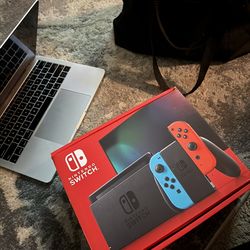 Nintendo Switch Console with Neon Blue and Neon Red Joy-Con