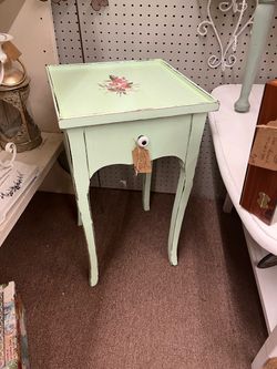 Light green table w faux drawer and bird transfer
