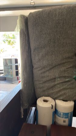 arm-less living room chair