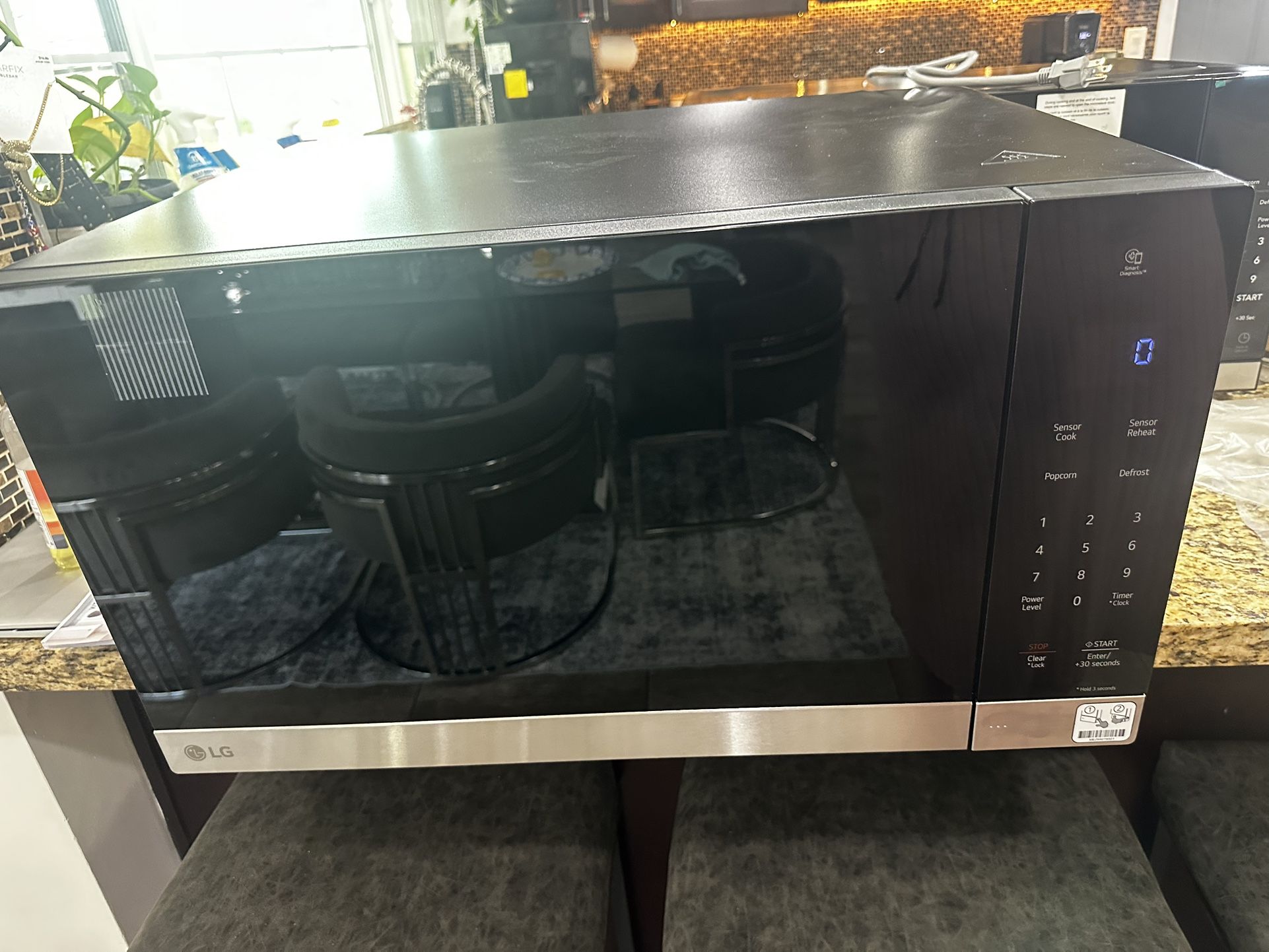 Brand New Dented Microwave