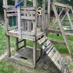 Free swing set. Indianapolis, Geist area. You must disassemble and load. Is weathered but still has good parts.