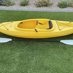 Kayak with paddle