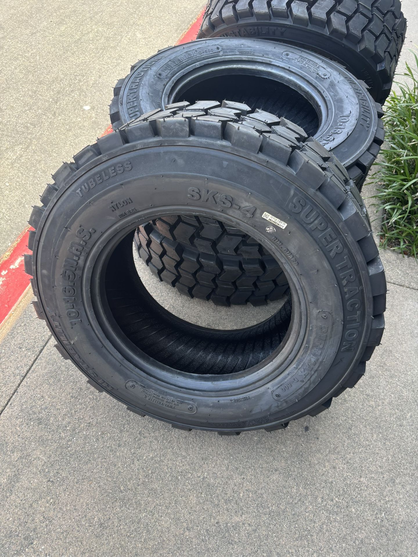 4 Bobcat Tires 10-16.5 $1000