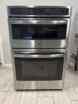 GE Profile microwave and oven combo works perfect in good condition 27 inch