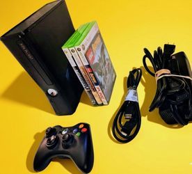 Microsoft Xbox 360 with 1 controller and 4 games, power supply and HDMI cord