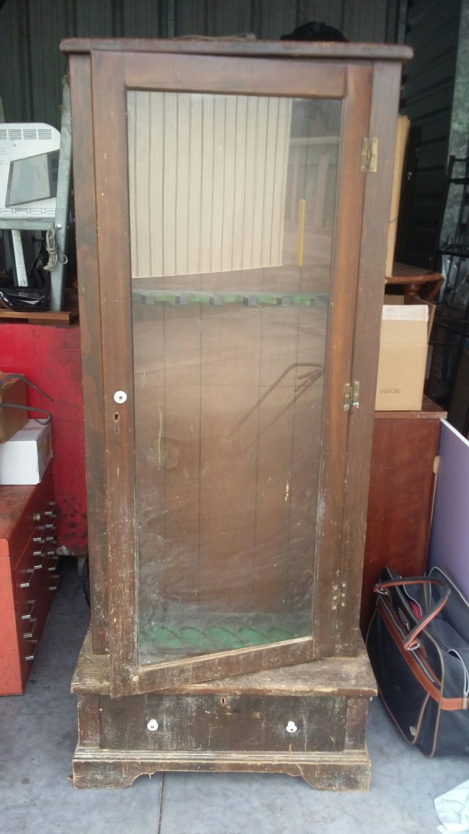 Antique gun rack cabinet. Glass and hardware intact