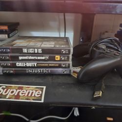PS3 + Controller And Games 