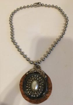 Authentic copper pearl medallion necklace.