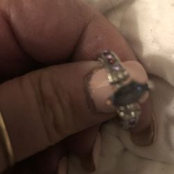 Brand new mystic topaz size 8 ring with cubic zirconia stones on sides