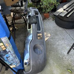 OEM GMC SIERRA FRONT BUMPER (DAMAGED)