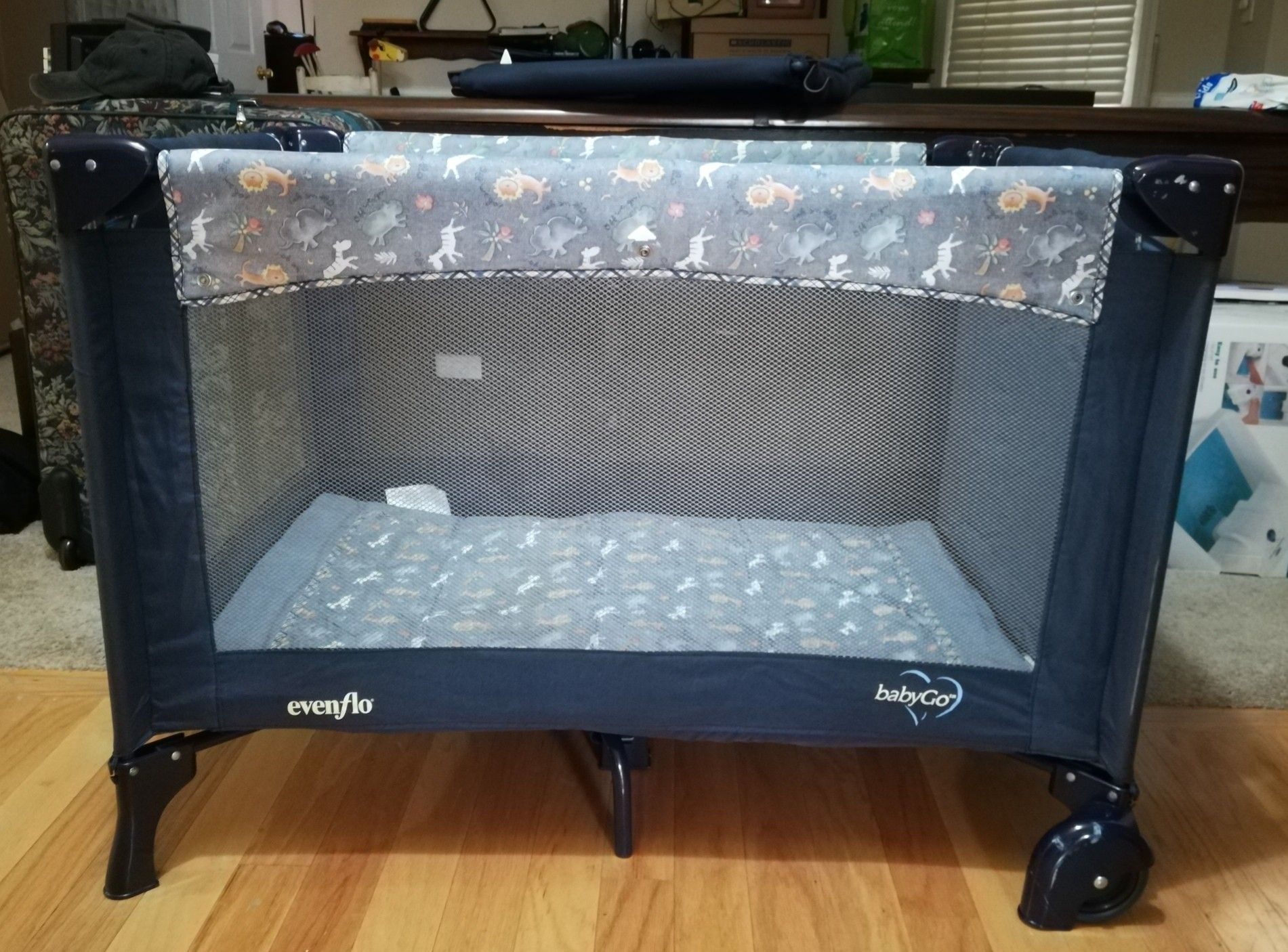 Evenflo OshKosh Pack and Play Deluxe Playpen Bassinet Changing Table