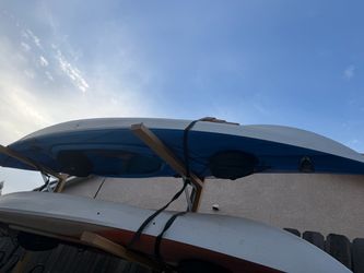 Three Kayaks with Storage Rack