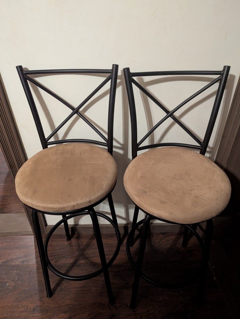 2 Barstools With Beige Seat Cushions