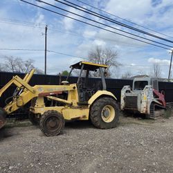 New Holland Loader Tractor & Takeuchi TL10 Loader