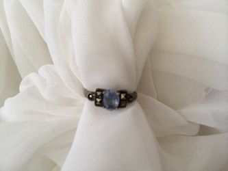 Light blue/purple ring