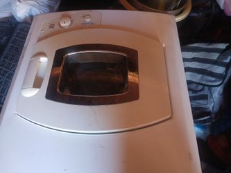 This white NewAir portable mini dryer .