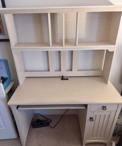 Wooden office desk with hutch