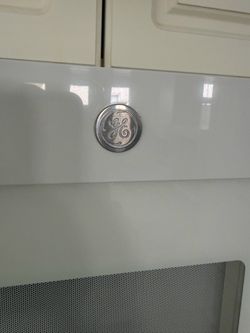 Trade or buy GE White Refrigerator like new paid $2000 for it 1and 1/2 a go