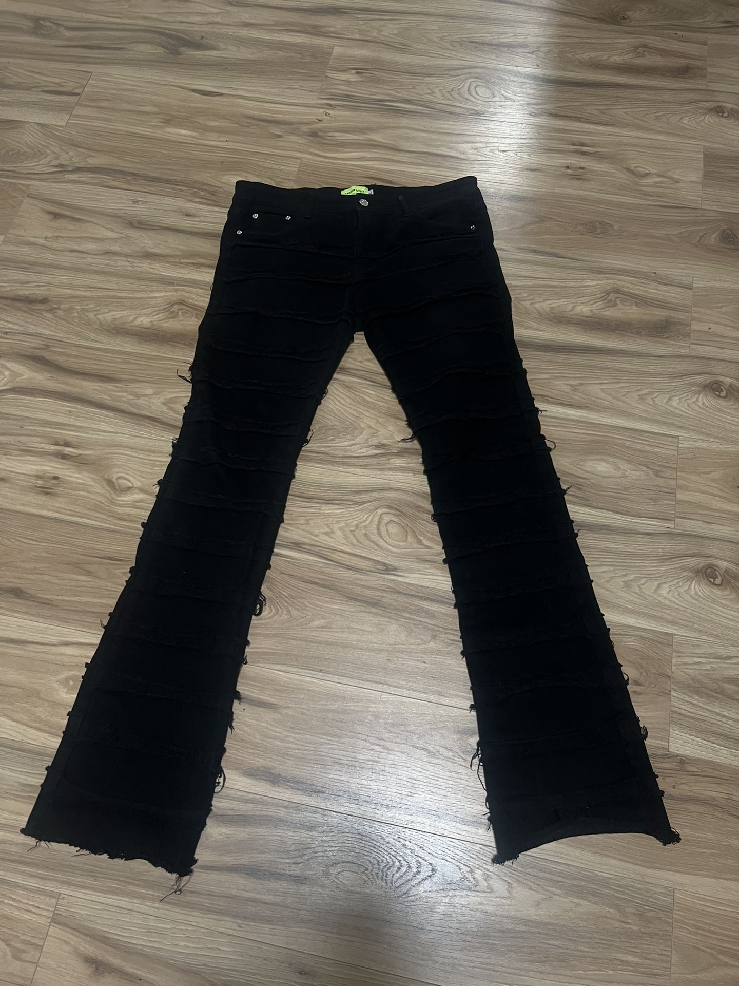 Black Distressed stacked jeans size 34